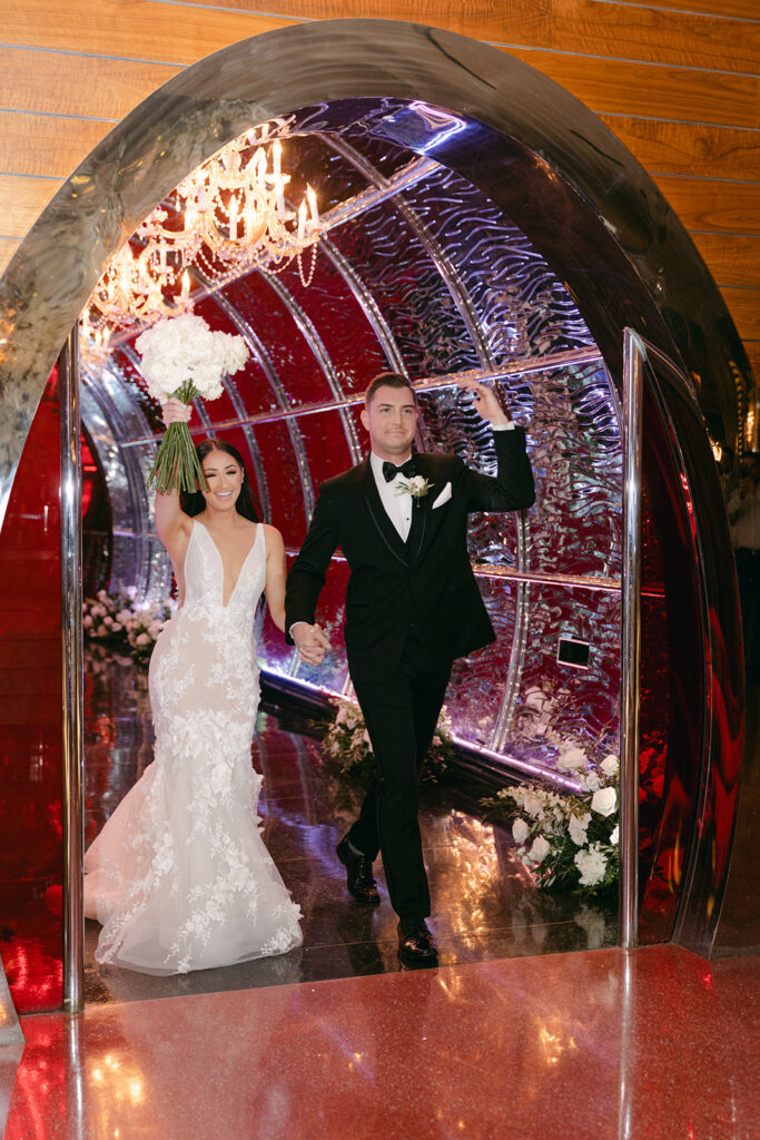 Bride and Groom entering reception 