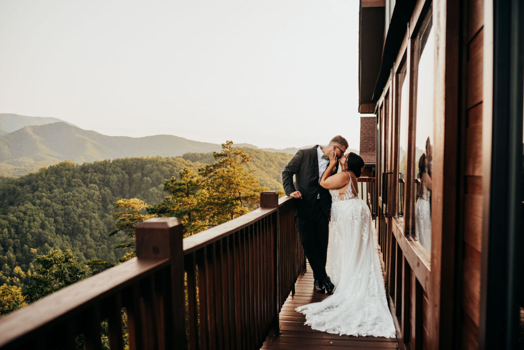 Rolling Hills and Tennessee Whiskey. Newlyweds kiss in the great smokey mountains 