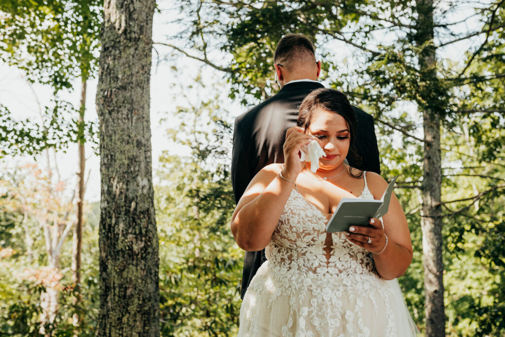 Bride teary eyed while reading her personal vows 