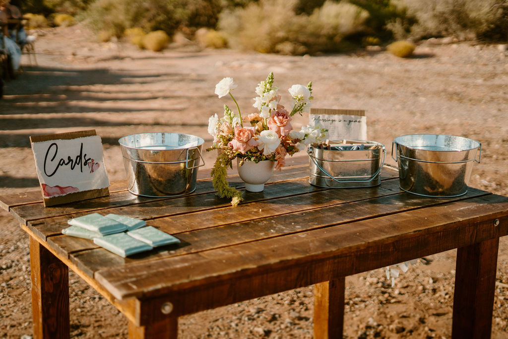 Table that holds decorations for cards and advice for the bride and groom.