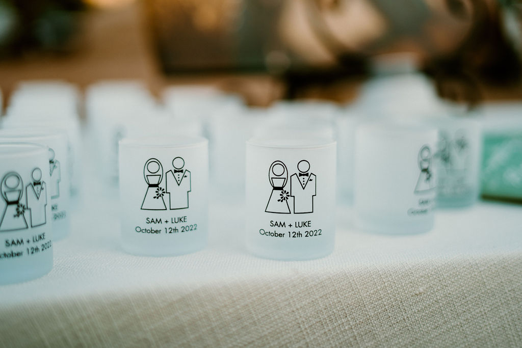 Bride and Groom personalized shot glasses with names and wedding date.