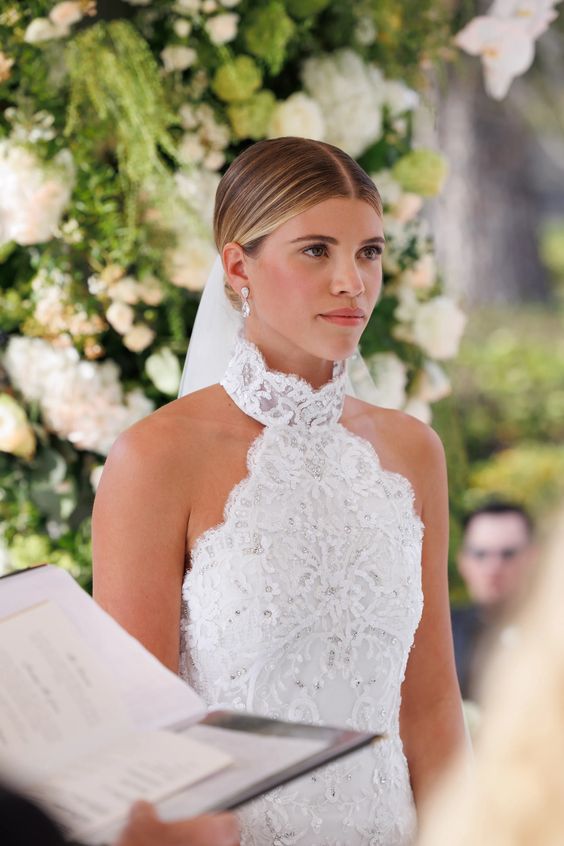 How to Choose the Perfect Wedding Day Hairstyle: Middle Part Sleek Bun