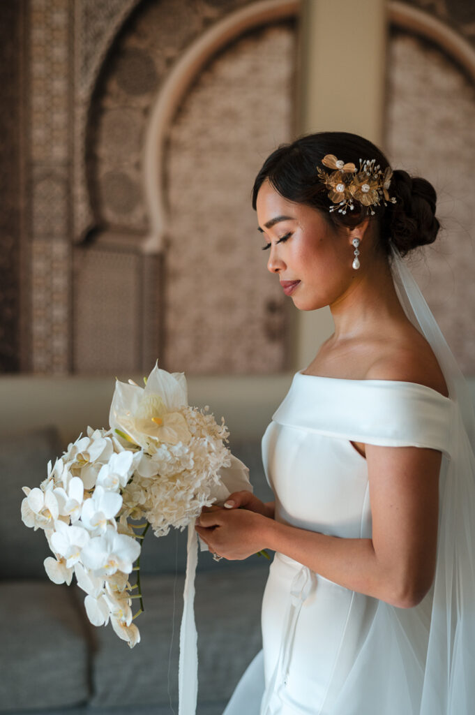 How to Choose the Perfect Wedding Day Hairstyle: Statement gold hairpiece with low bun 