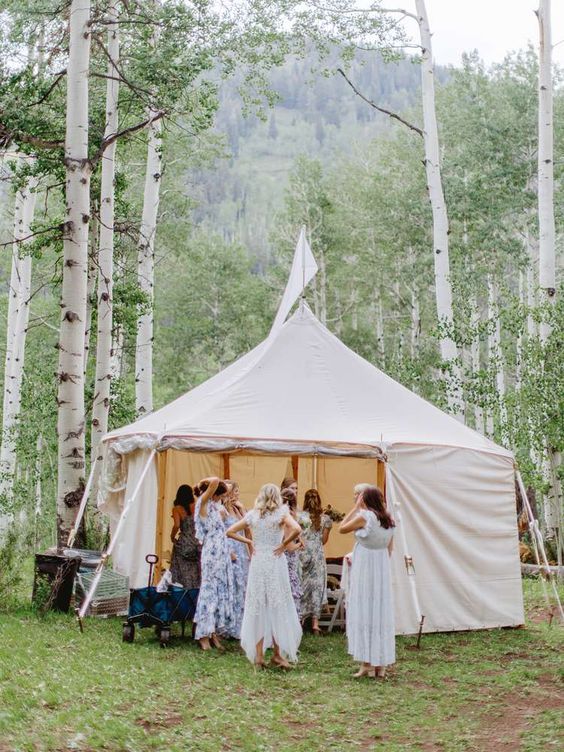 5 Trendiest Bach Party Themes Up in the mountains is a simple canvas tent to enjoy the outdoors. The bachelorette party wearing sundresses and enjoying the day. 