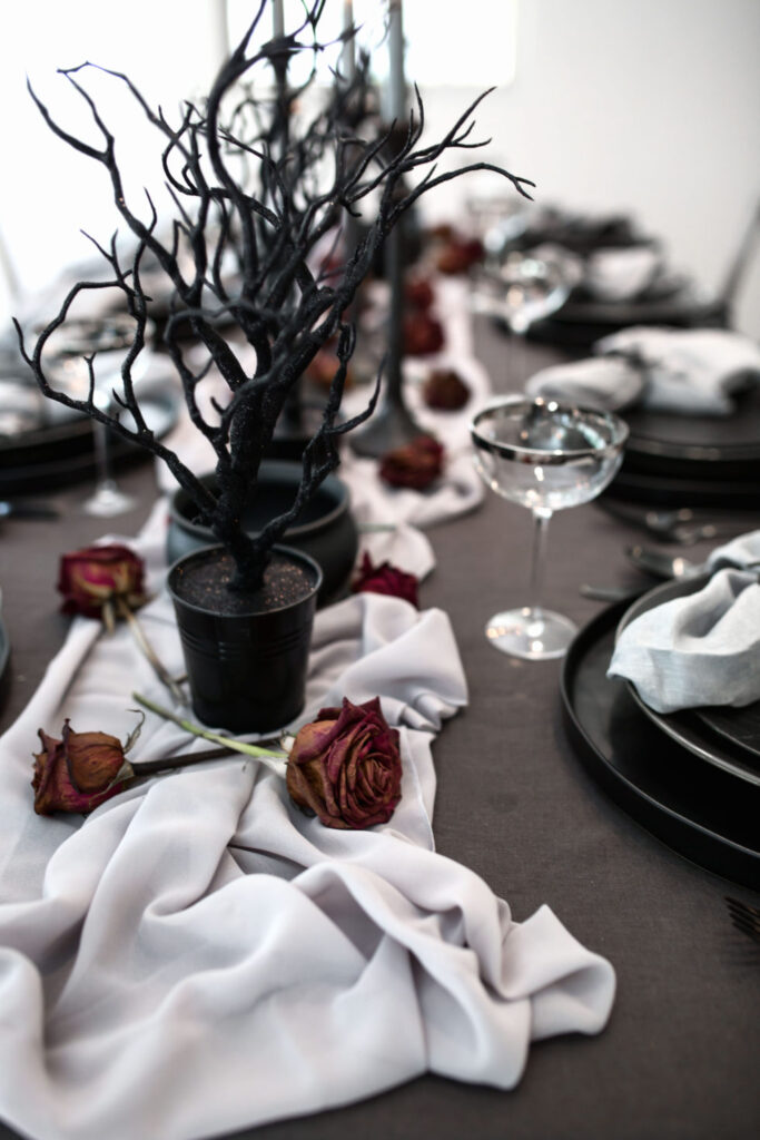 black twigs as centerpiece for halloween decor 