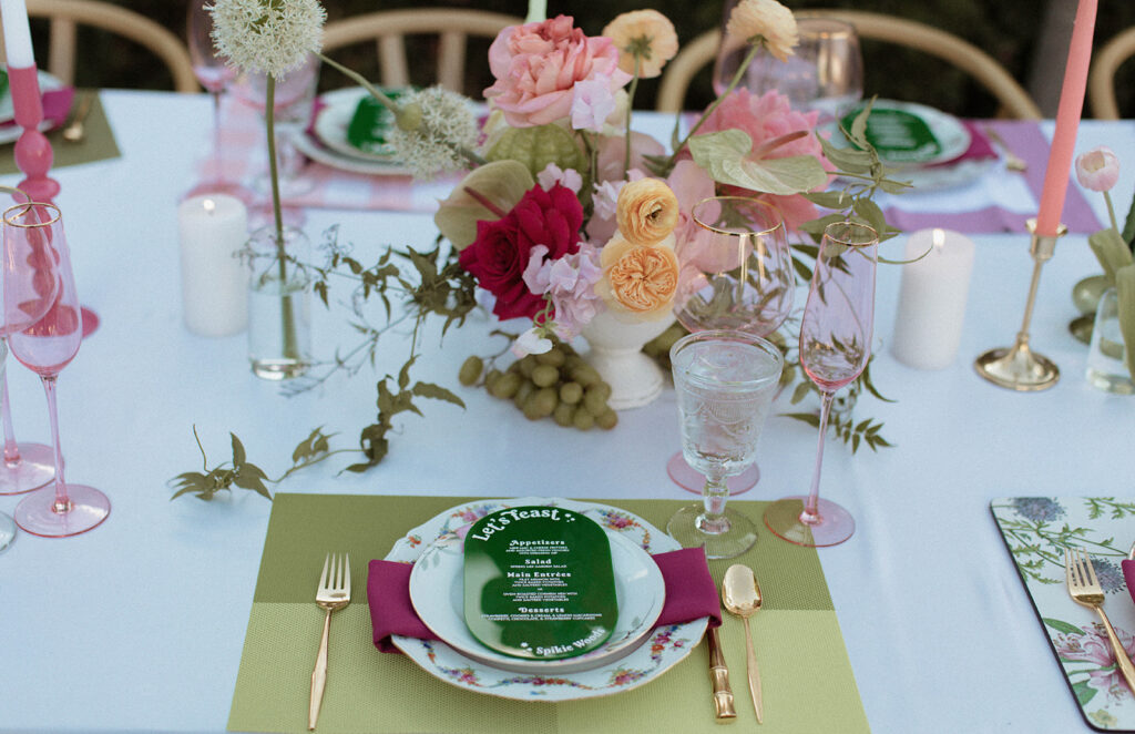The Ultimate Garden Party Wedding: Your Dream Day Blossoms Here! Pink and Green Wedding Tablescape and place setting with fruit, stationery, and florals 