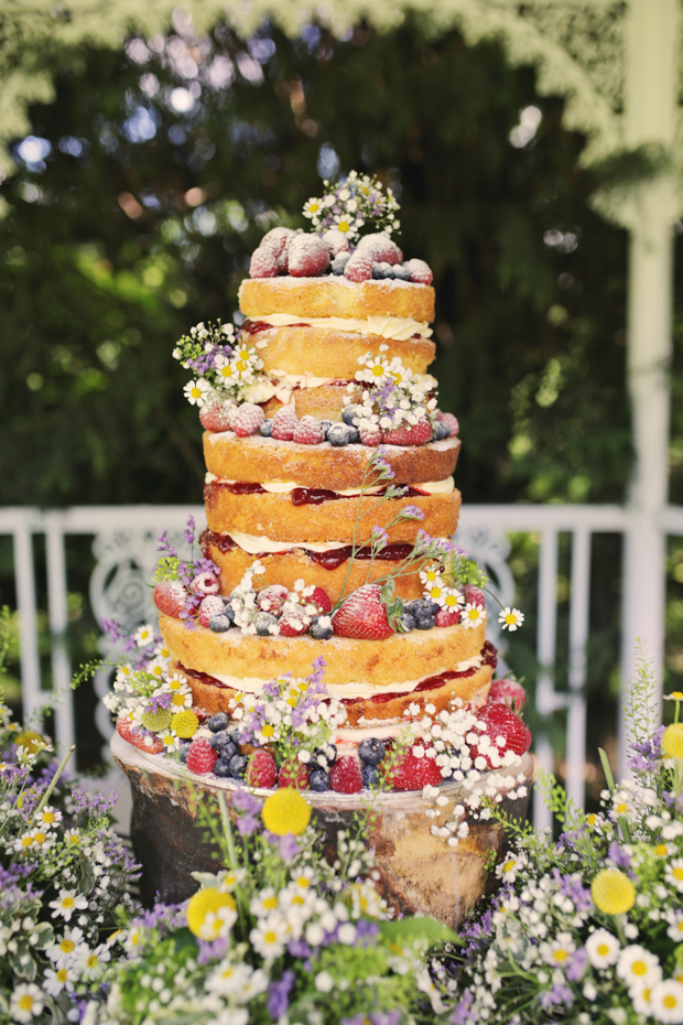 The Ultimate Garden Party Wedding: Your Dream Day Blossoms Here! Naked cake with fruit and florals for wedding. 
