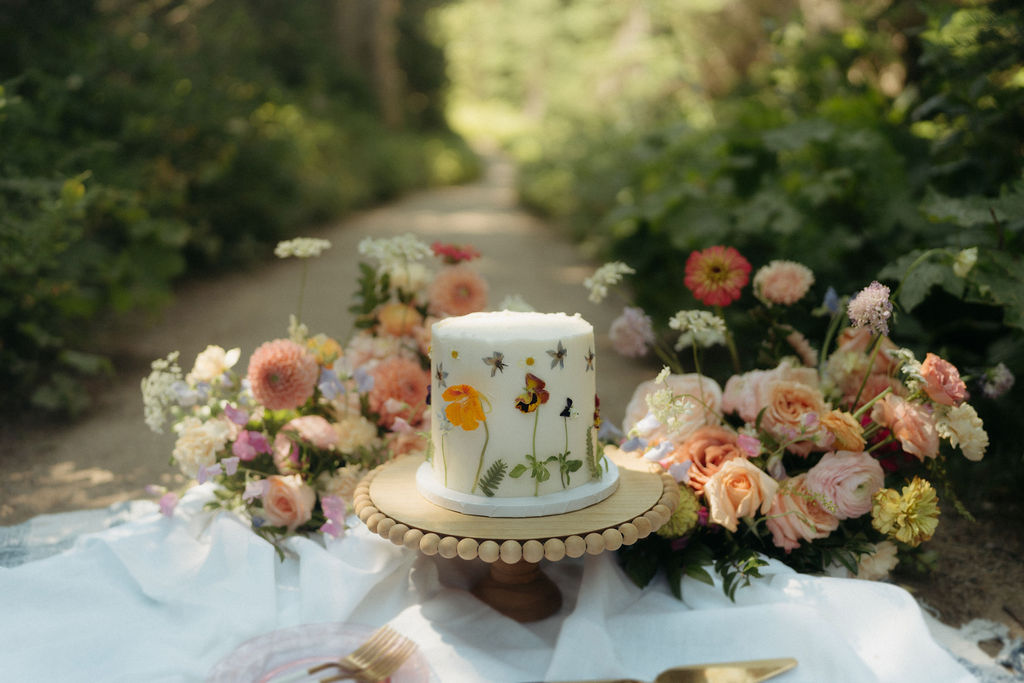 The Ultimate Garden Party Wedding: Your Dream Day Blossoms Here! Glacier National Park Cake with wildflower floral inspiration 