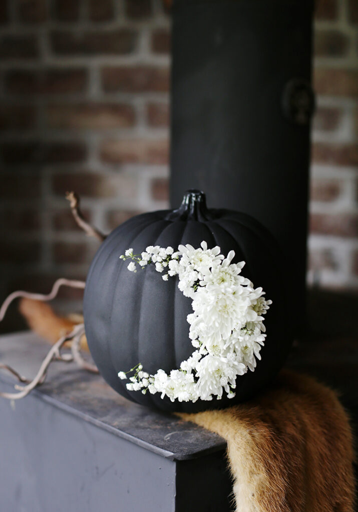 black pumpkin with floral moon 