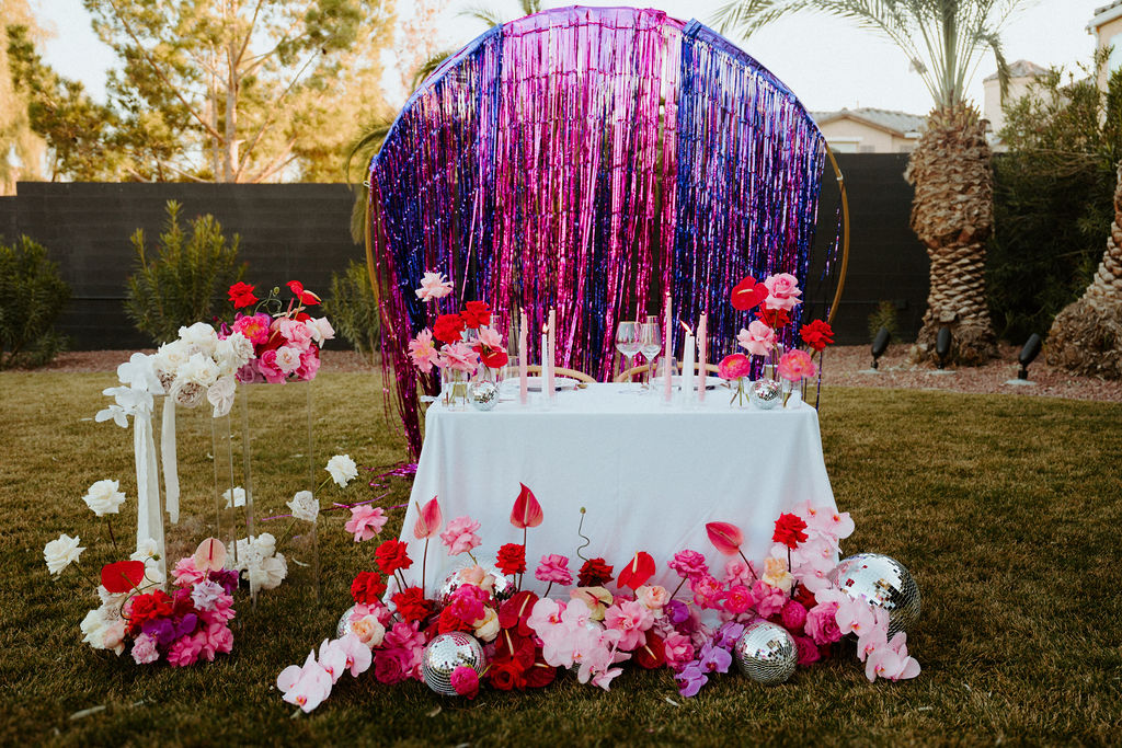 Sweetheart table with streamers 
