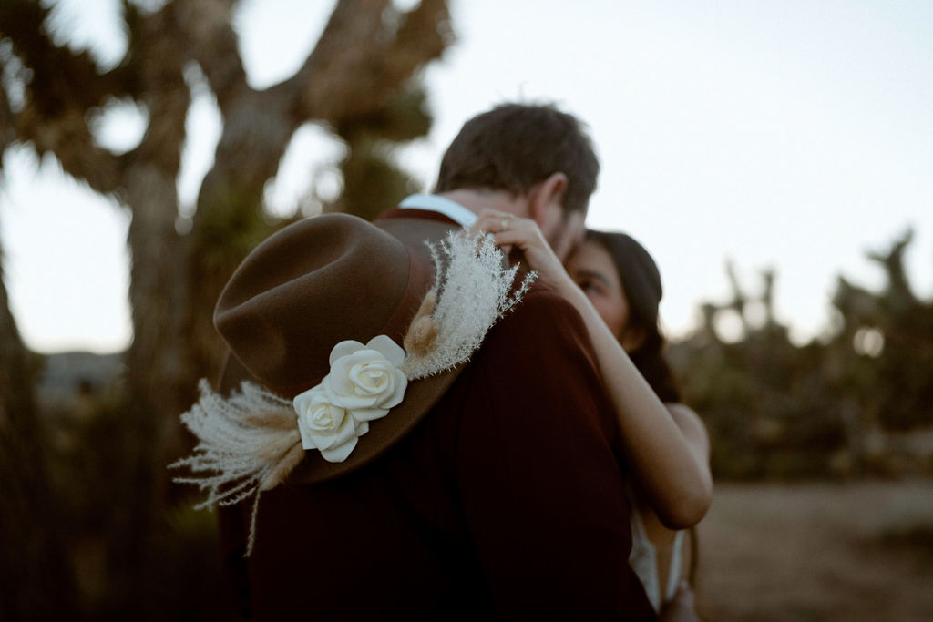 wedding hat with florals. Intimate Elopement at Rimrock Ranch in Joshua Tree California
