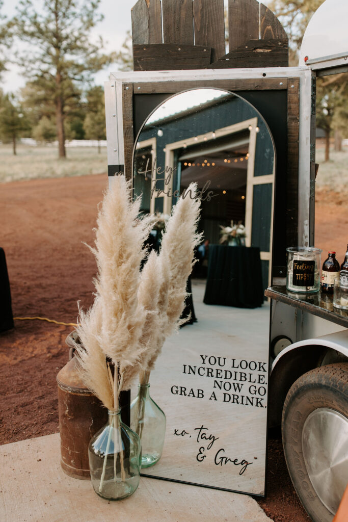 You look incredible, now go grab a drink wedding sign 