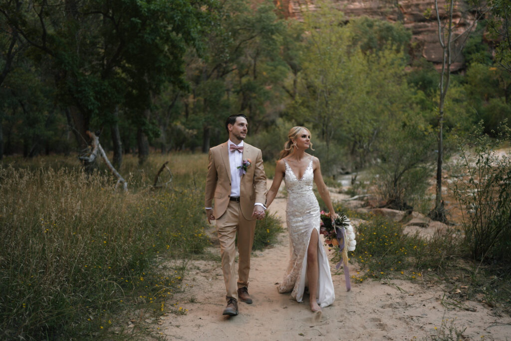 Beyond Vows: The Epic Zion National Park Wedding on the way to cut the cake