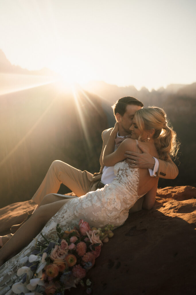 Beyond Vows: The Epic Zion National Park Wedding sharing a loving moment