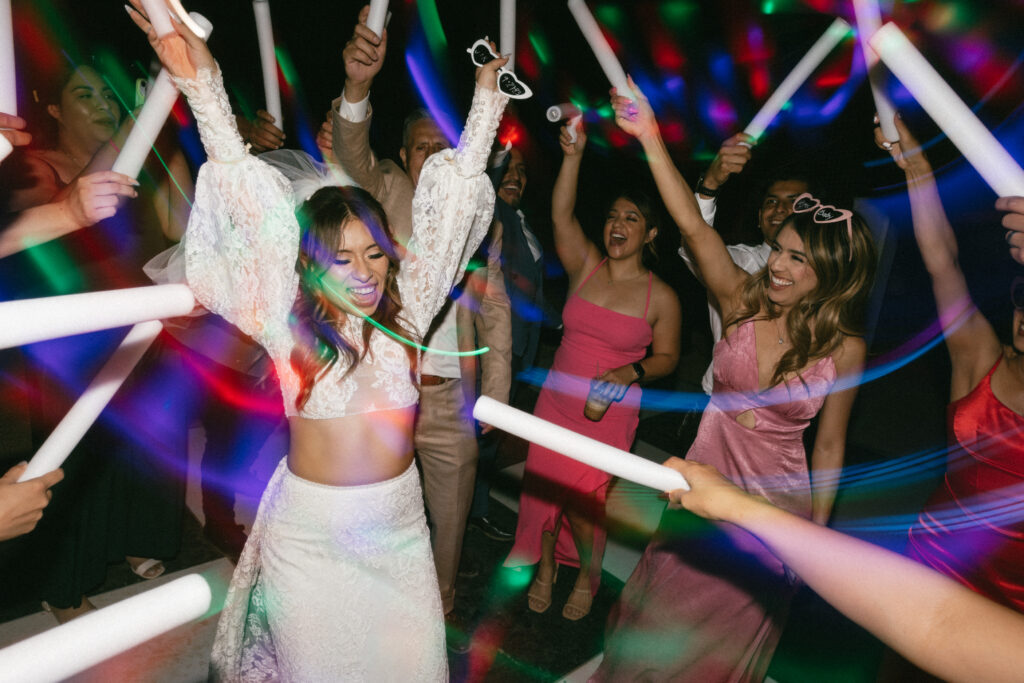 Original Wedding Ideas: Unique Dance Floor for One Helluva Party. Bride on Dance floor with Glow Sticks 