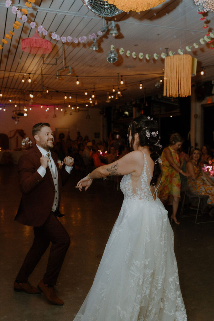 Groom and Bride Dancing for Grand Entrance on Dance Floor 