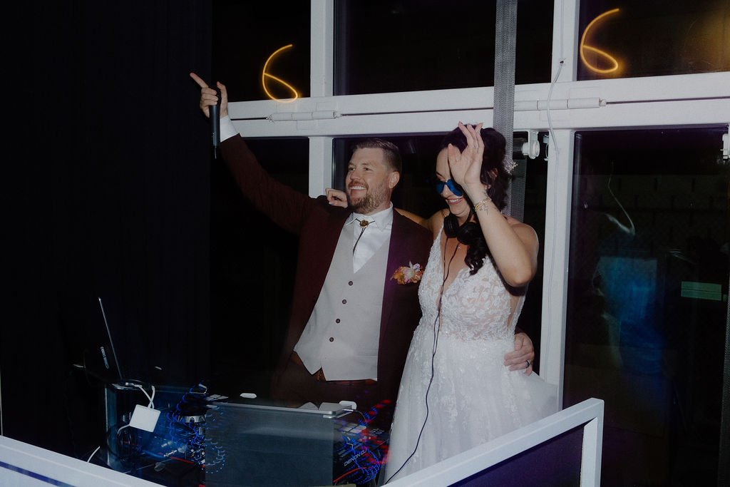 Original Wedding Ideas: Unique Dance Floor for One Helluva Party. Bride and Groom at DJ Booth 