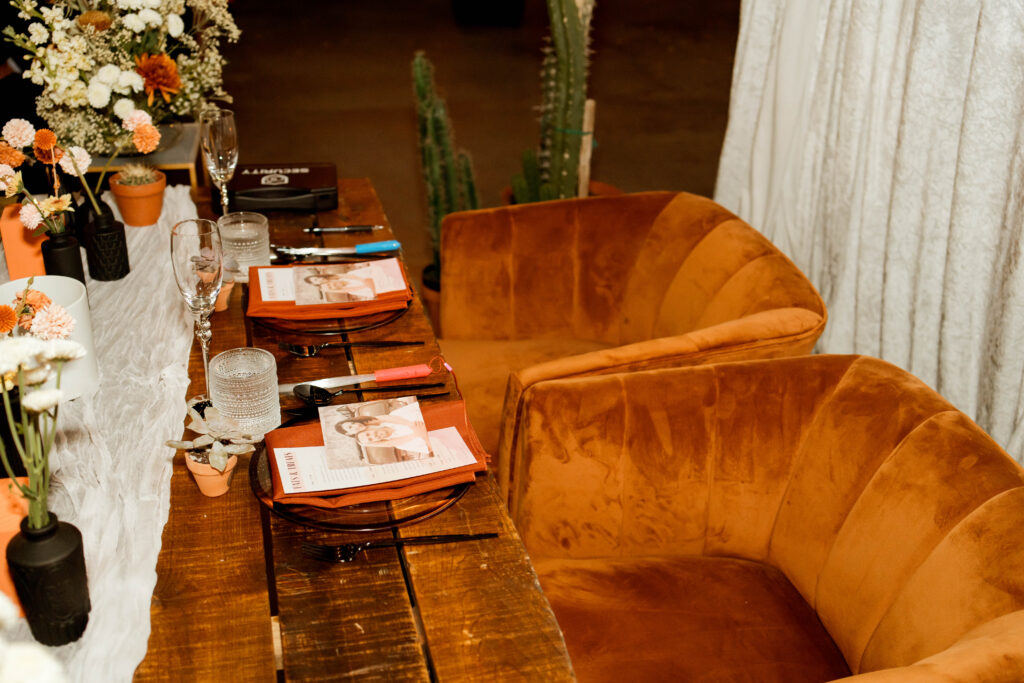 Amazing Orange Velvet Chairs tat the sweetheart table