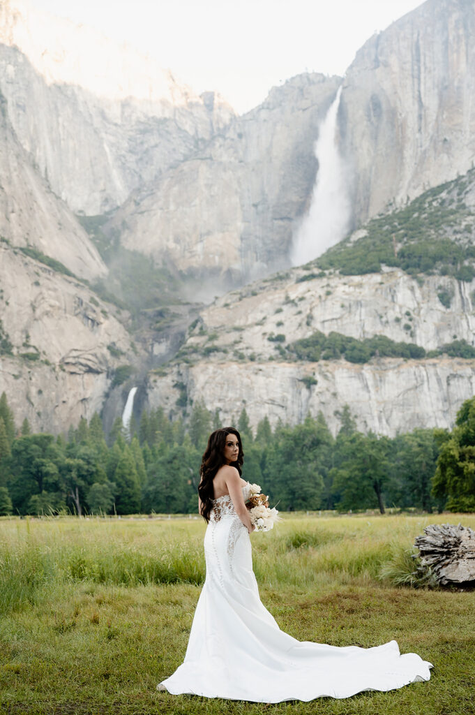 Yosemite Micro-Wedding: Why Intimate Celebrations are a Vibe. Bride with waterfall 