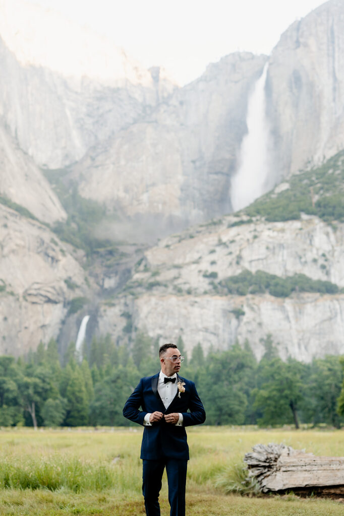 Yosemite Micro-Wedding: Why Intimate Celebrations are a Vibe. Groom with waterfall 