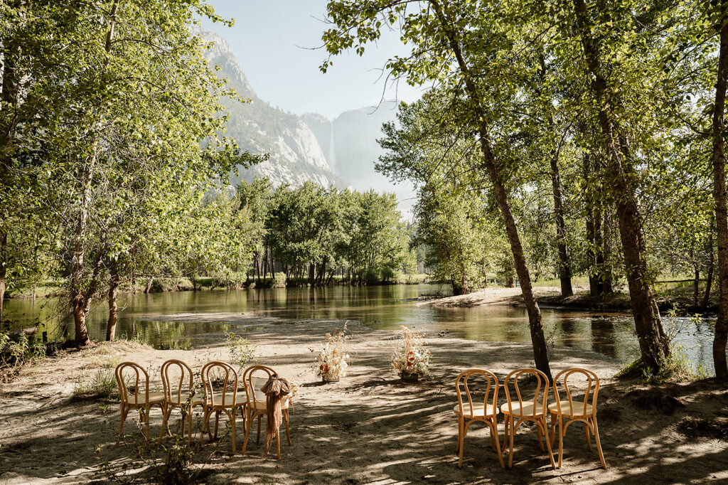 Wedding ceremony set up next to river 