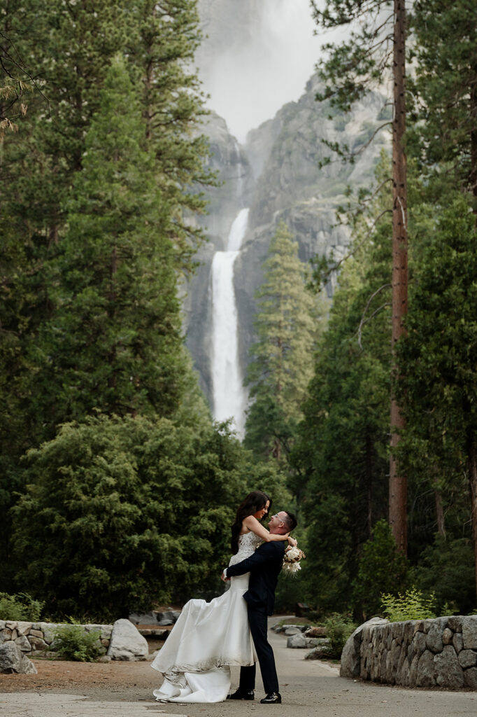 Newlyweds with waterfall 