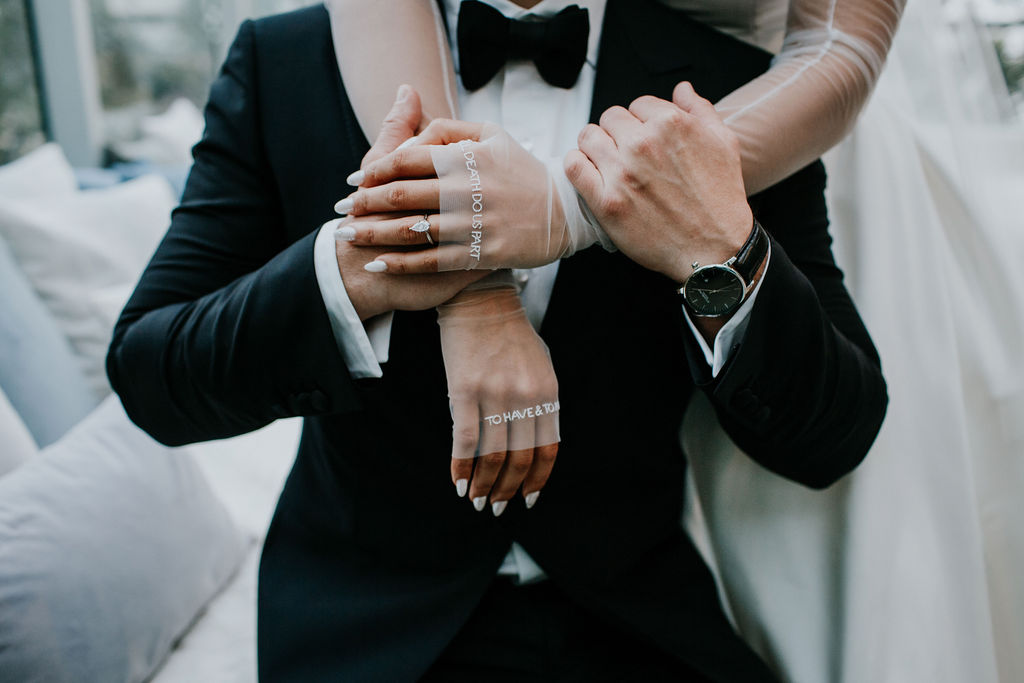 Fierce Wedding Nail Ideas. Newlyweds holding hands 