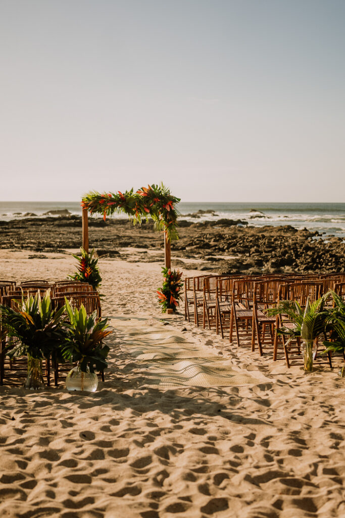 Intimate Beach Wedding Florals Down the Aisle 
