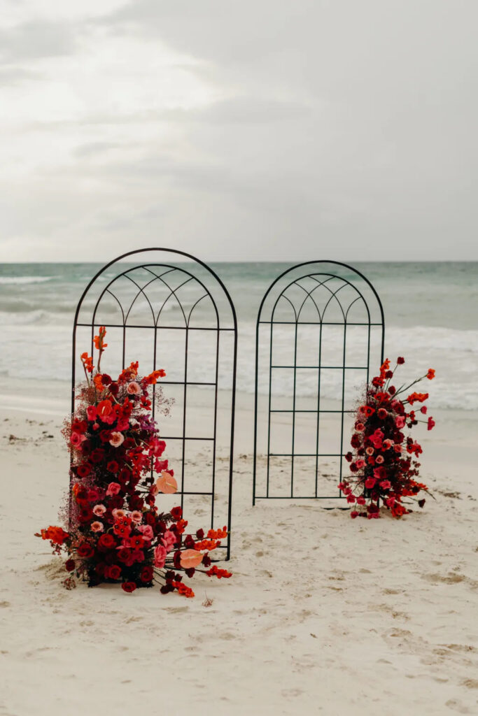Intimate Beach Wedding a bright and bold wedding arch