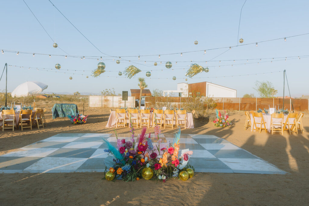 Lexi & Jacob Joshua Tree Wedding Reception with Checkered Dance Floor and Hanging Lighting and Elements