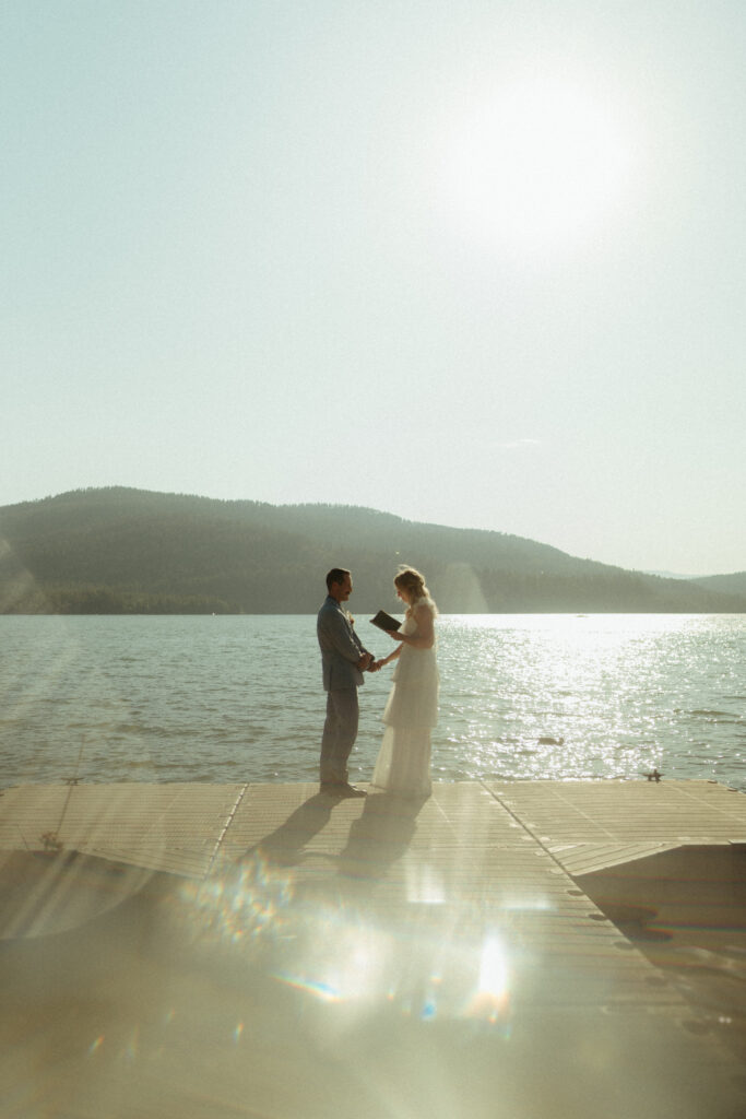Glacier National Park Wedding, Niki Day Creative the bride and groom sharing private vows