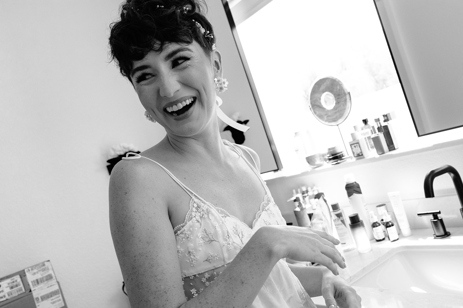 bride getting ready before her garden party wedding