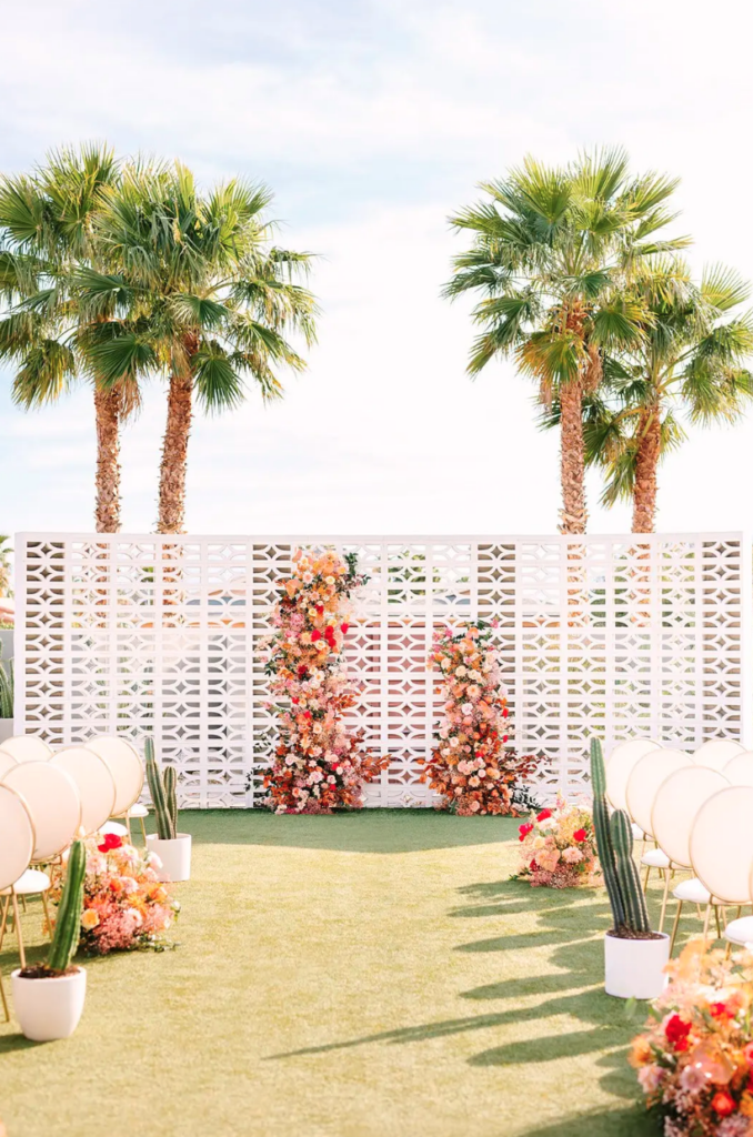 outdoor colorful wedding ceremony at The Lautner Compound in Desert Hot Springs California