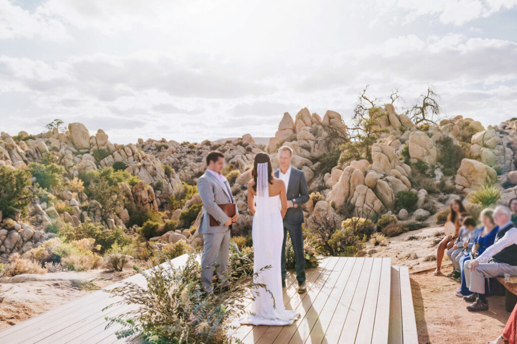 wedding couple getting married in the desert landscape in Boulder Grove Ranch