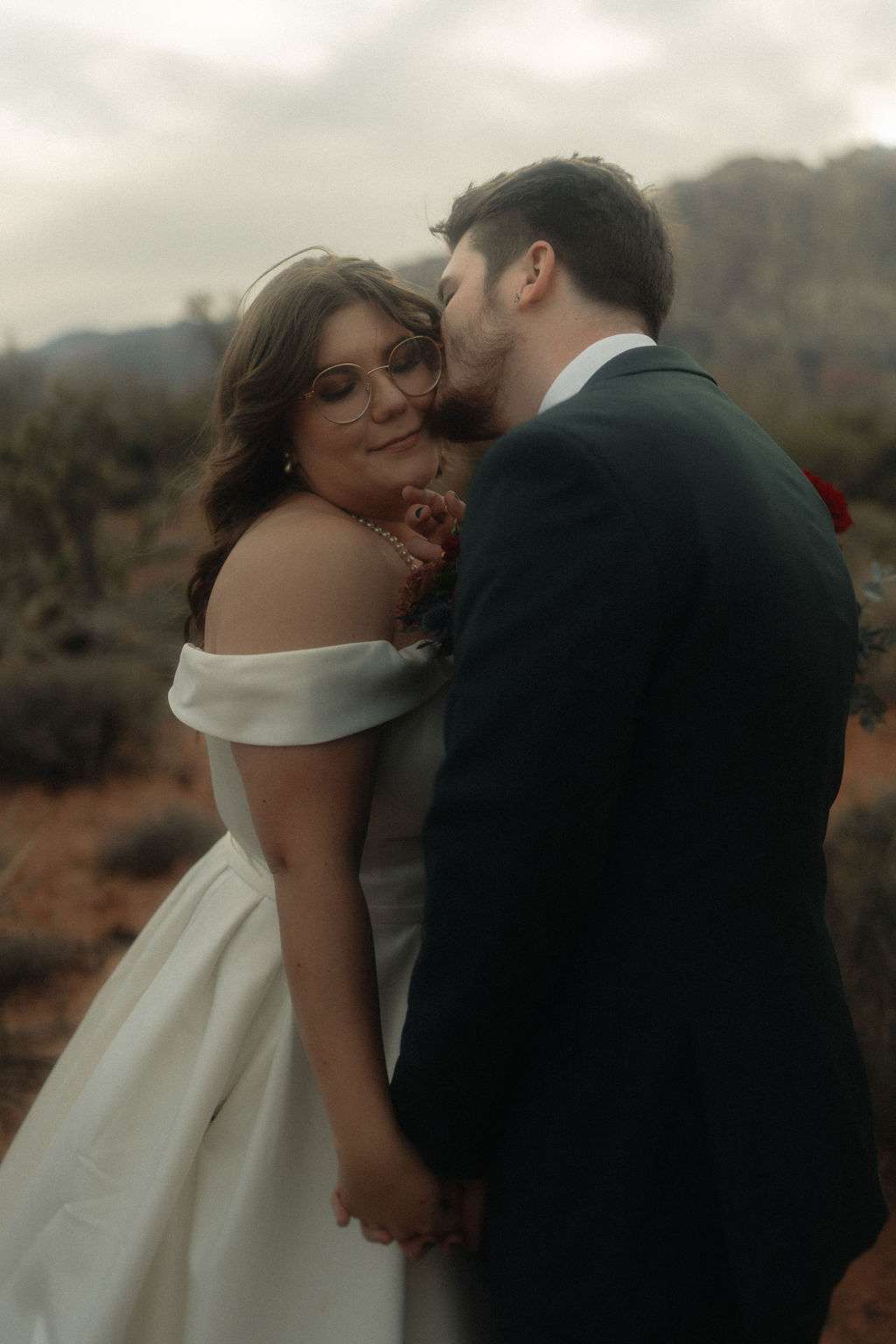 Couple posing on their wedding day at Cactus Joe's Nursery