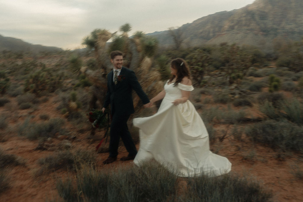 Couple posing on their wedding day at Cactus Joe's Nursery