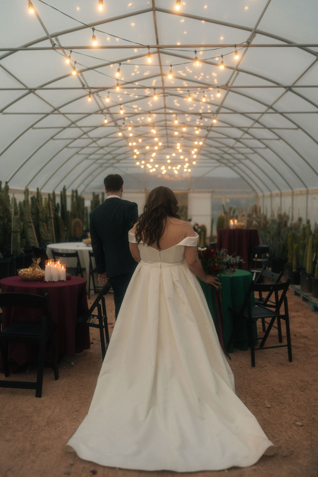 Couple entering their their wedding reception 