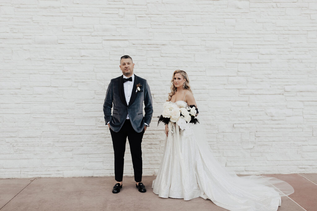 Bride, Groom, White florals, White wall, Wedding