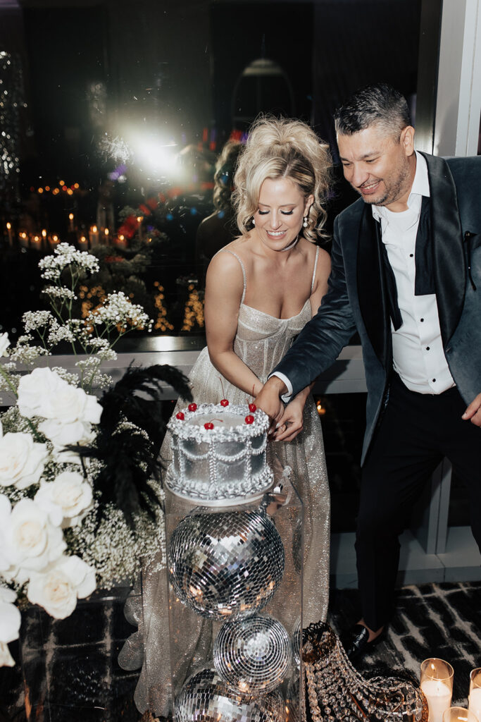 chrome cake, cherries, red velvet, reception, bride, groom, disco ball, Palms casino